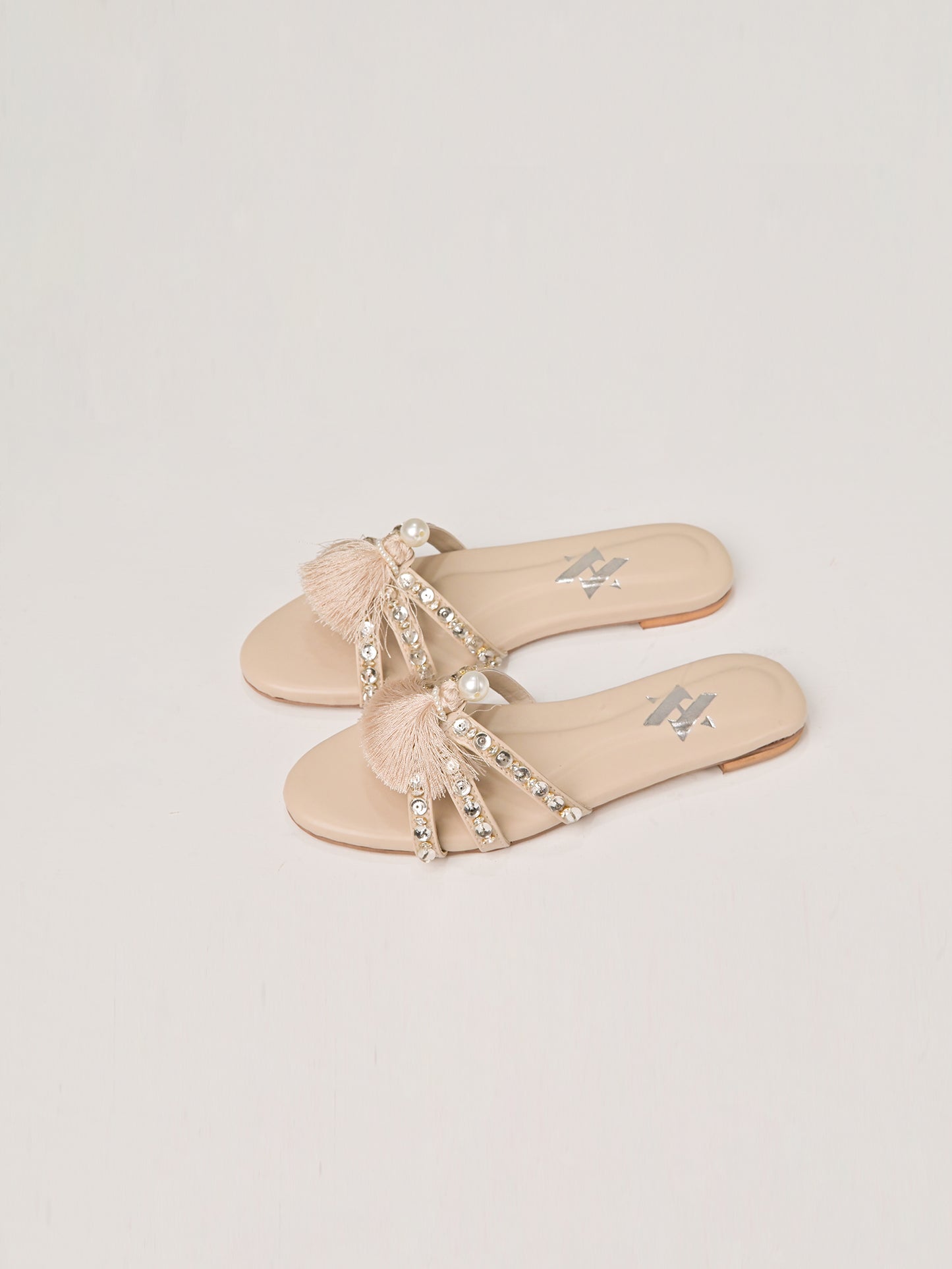 Ivory Tassel Crystal Flats